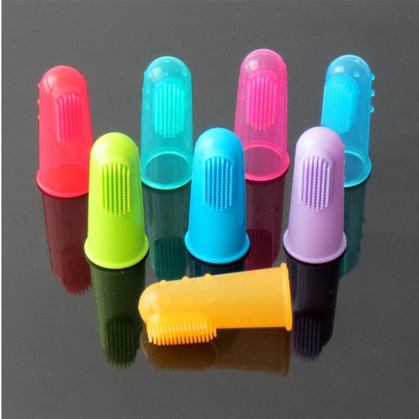 Silicone finger toothbrushes shown in several colours