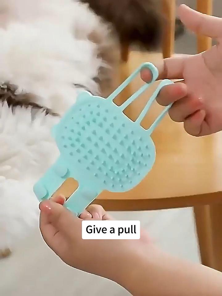 Pulling the cat self-groomer around a chair leg to fasten it